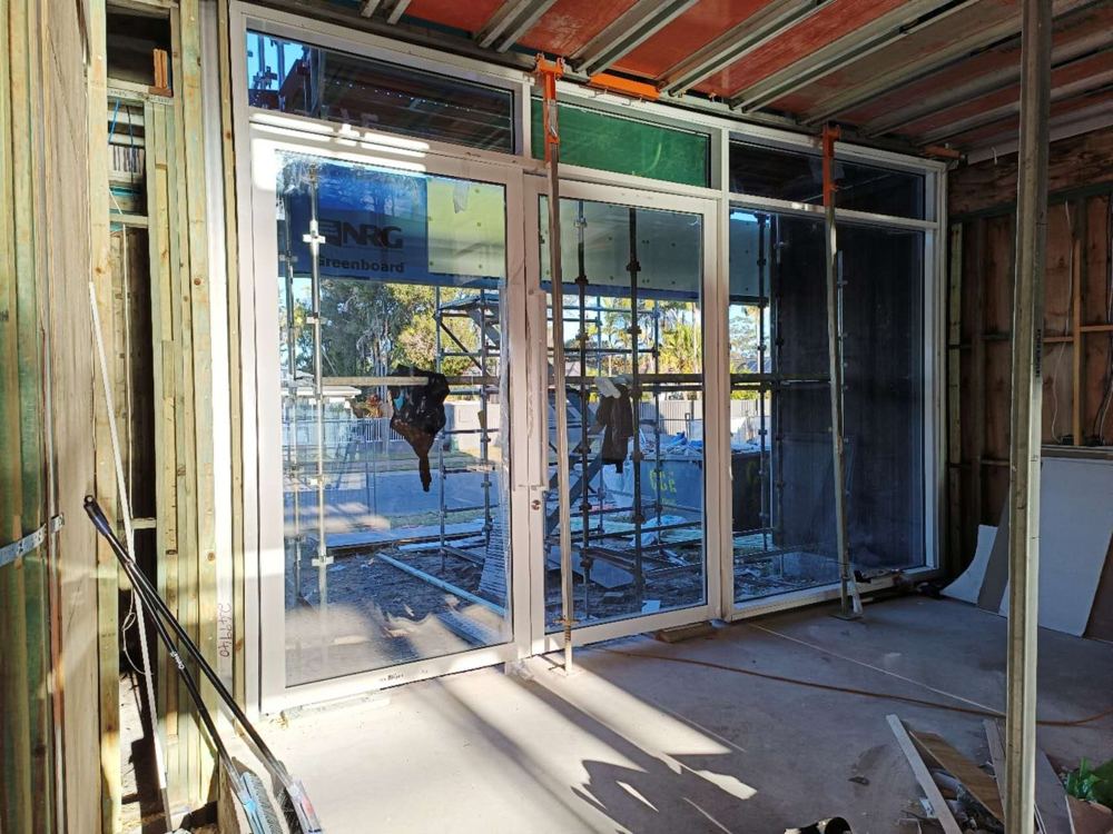 Aluminium sliding doors being installed